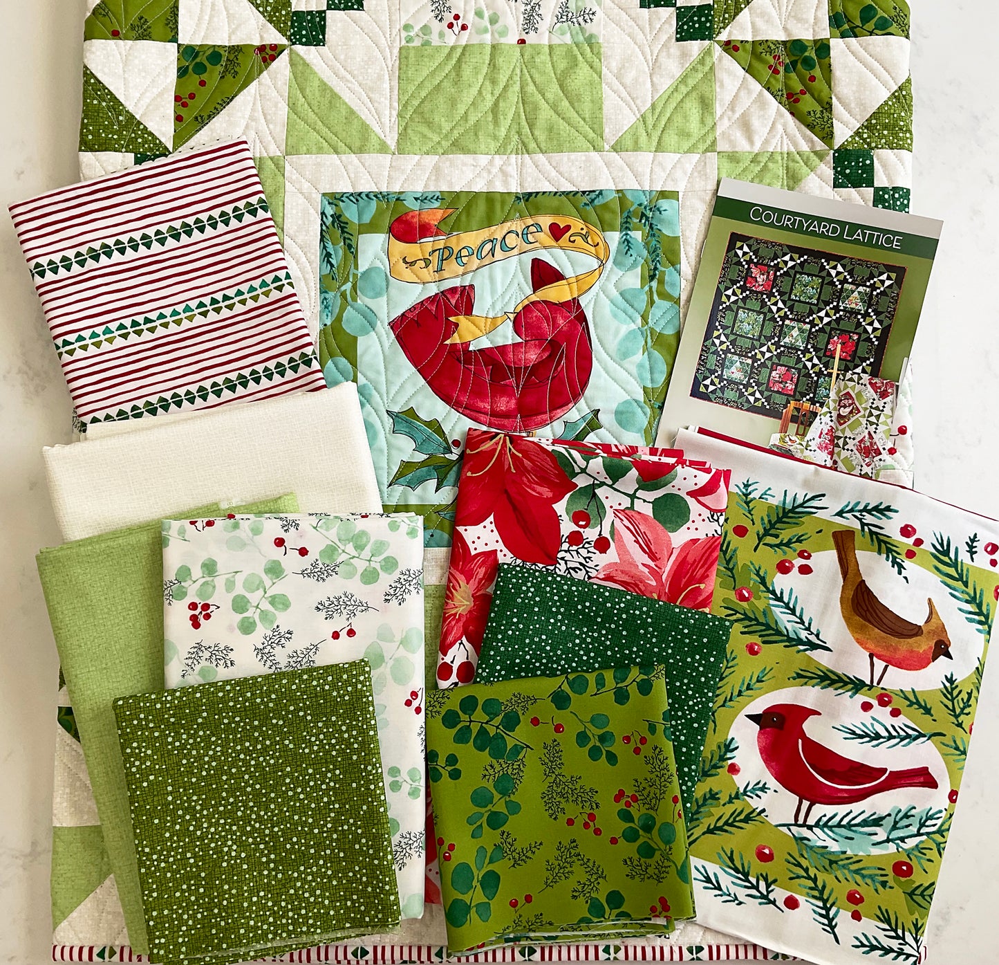 A Quilt Kit of Courtyard Lattice in Light Colorway using Panel